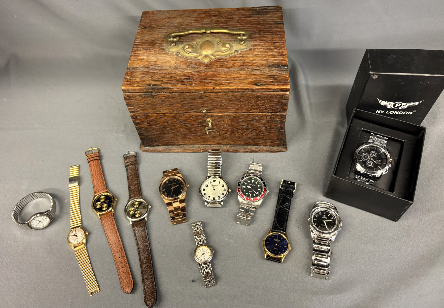 Boxed watch and wooden box with loose watches